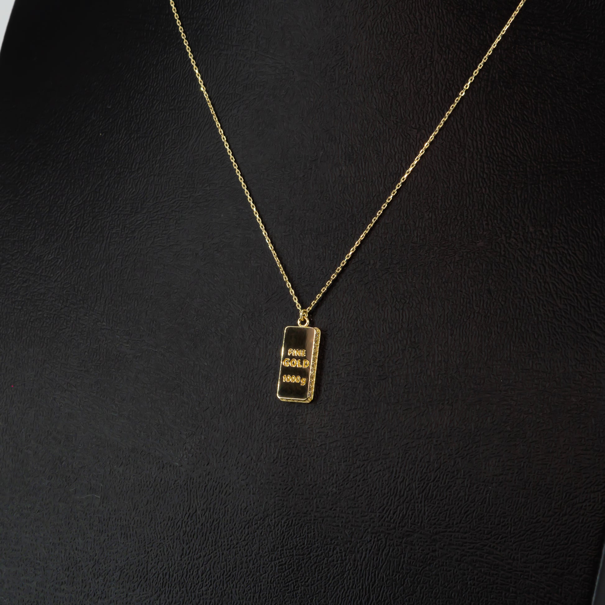 Collar con dije "Lingote" de oro 10k