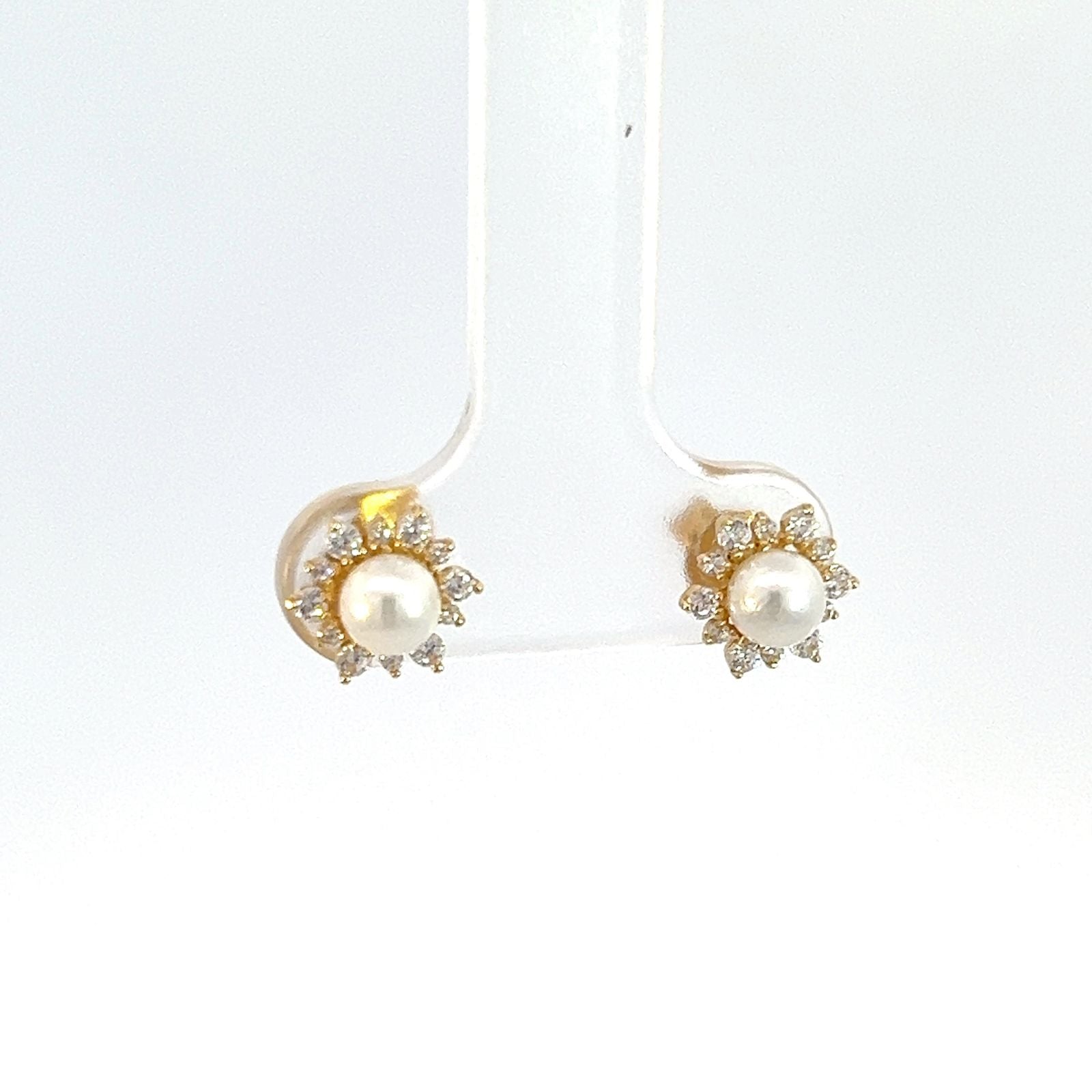 Broquel Coreano "flor" oro 10k con Zirconia Suiza