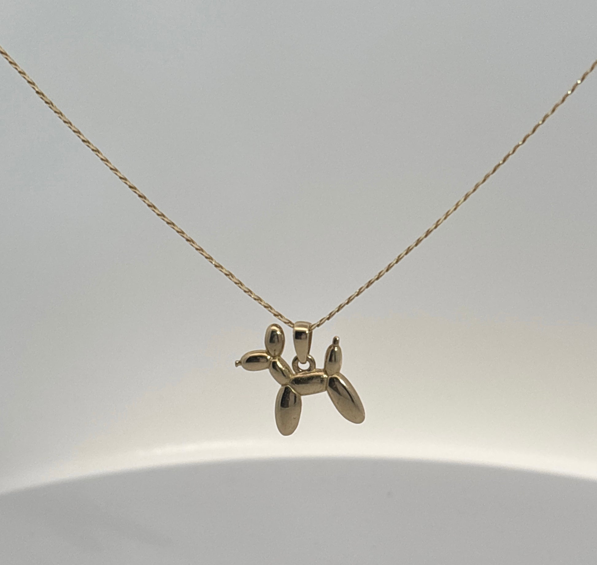 Collar con dije "Ballon Dog" oro 10k