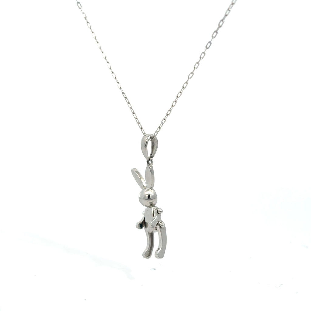 Collar con dije "conejo lego" con movimiento oro blanco 14k