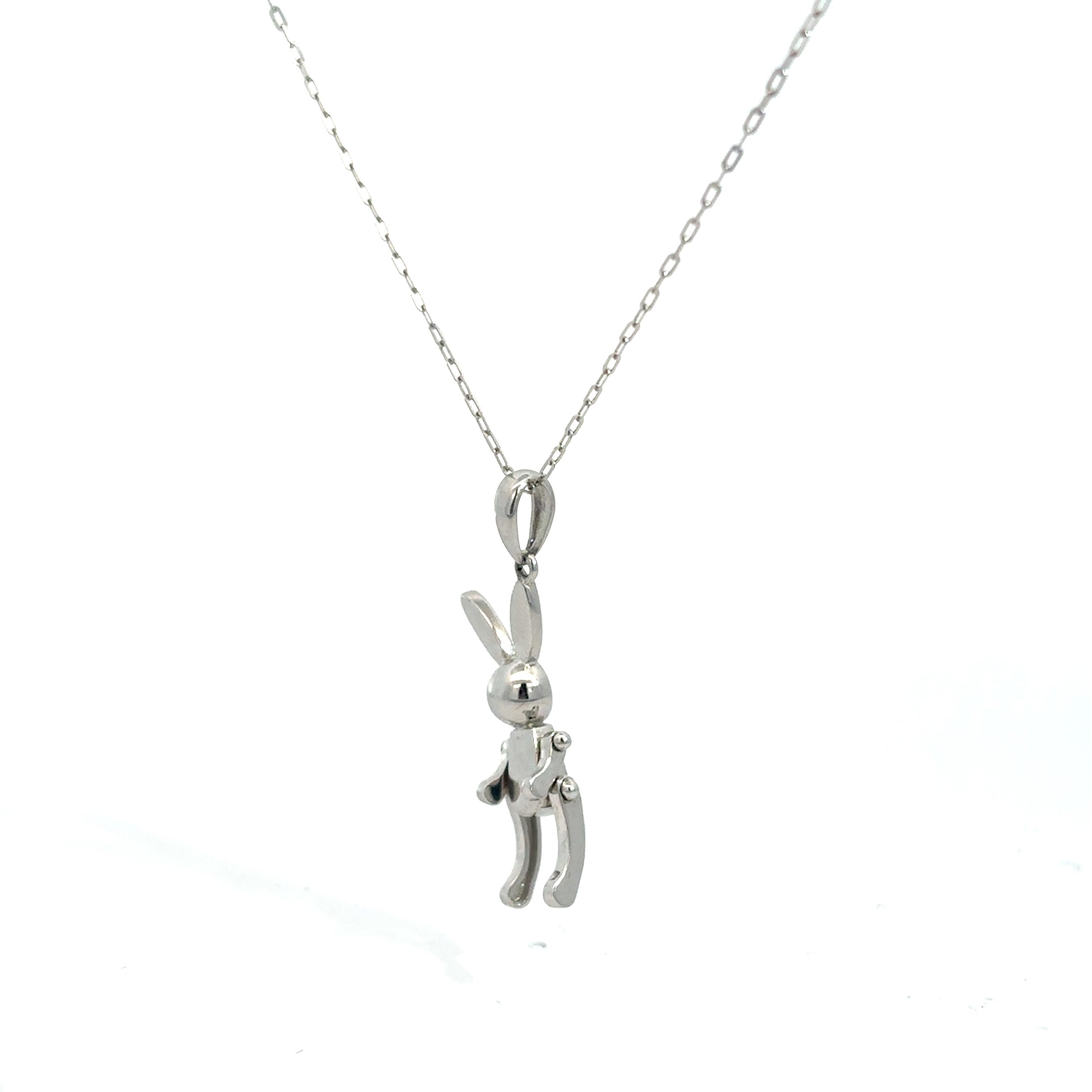Collar con dije "conejo lego" con movimiento oro blanco 14k
