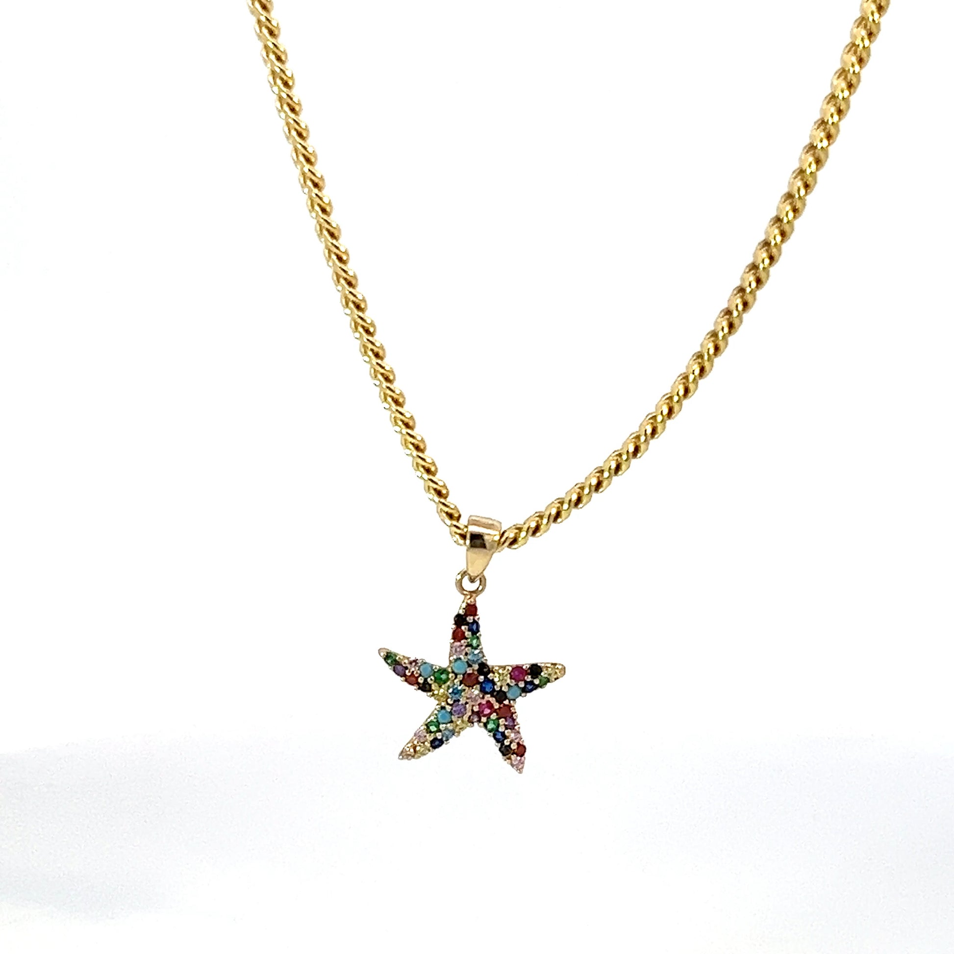 Dije de estrella en oro 10k Zirconia Suiza