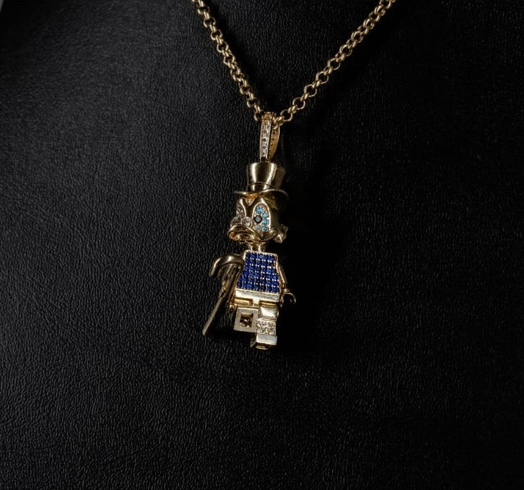 Dije de lego Mc Pato en oro 10k con Zirconia Suiza