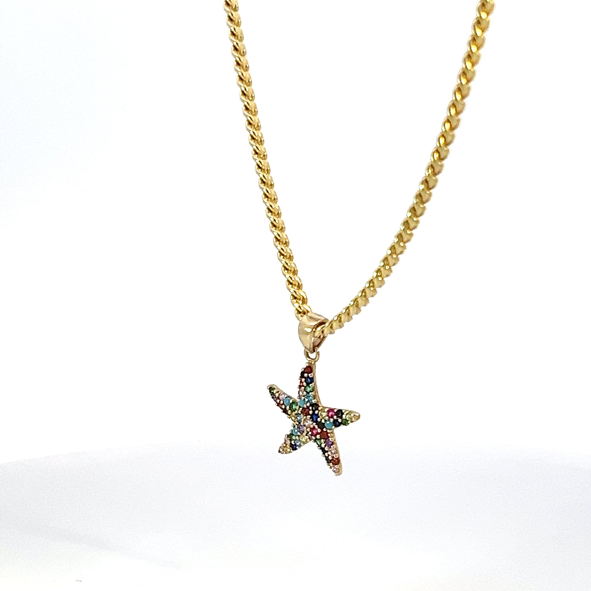 Dije de estrella en oro 10k Zirconia Suiza